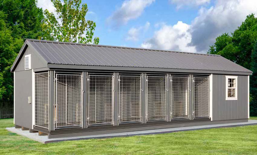 12x32 Commercial Kennel with gray siding, gray roofing, and white trim.