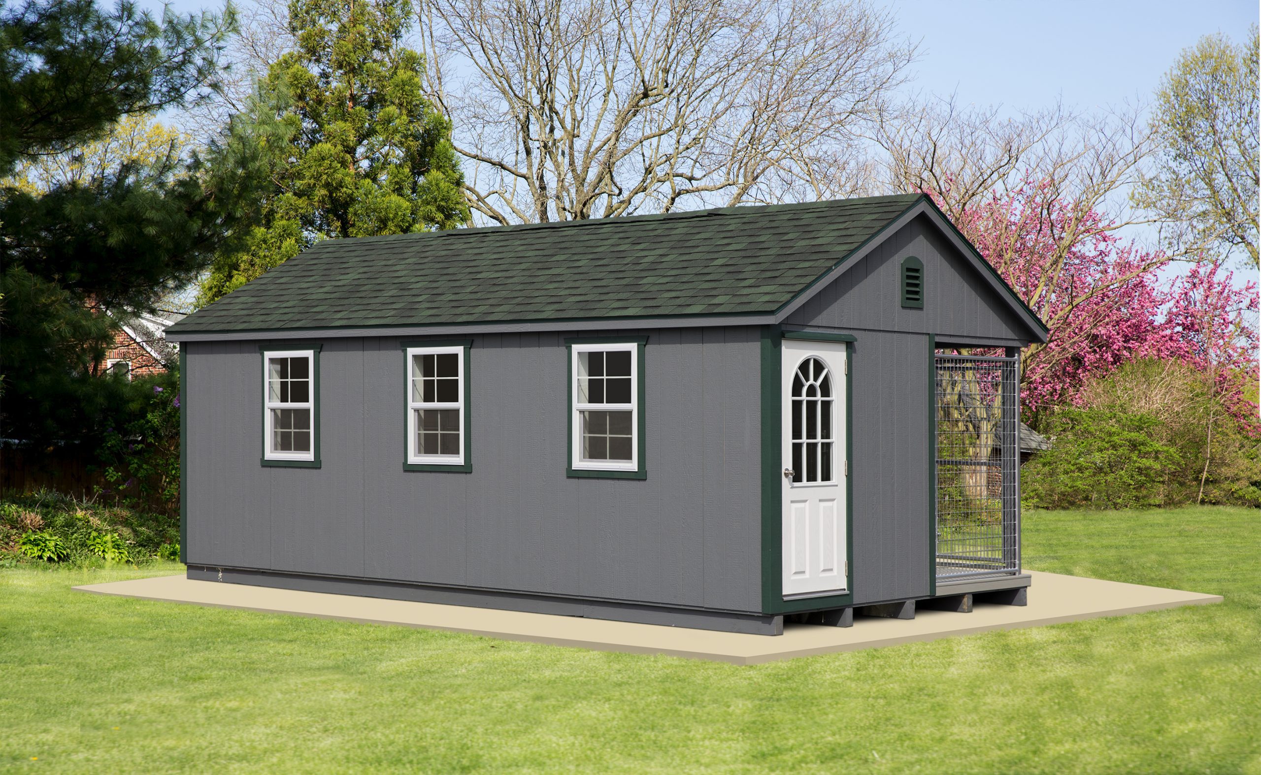 12x22 Commercial Kennel with 6 dog runs, dark gray siding, green roofing, and green trim.