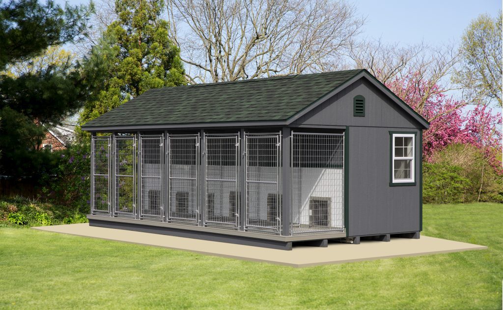 12x22 Commercial Kennel with 6 dog runs, dark gray siding, green roofing, and green trim.