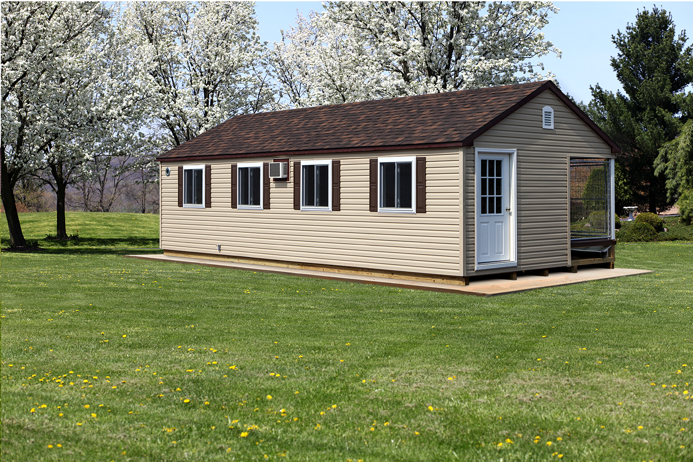 14x32 commercial kennel with 8 dog runs, tan siding, brown roofing, and white trim.