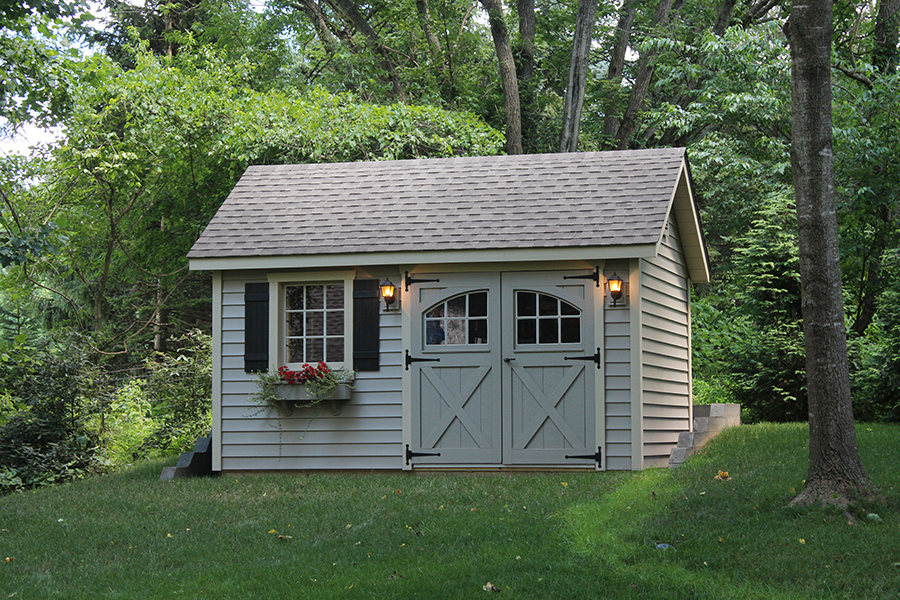 Front exterior of a light gray Garden Shed