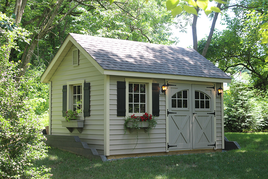 Front and side exterior of a light gray Garden Shed