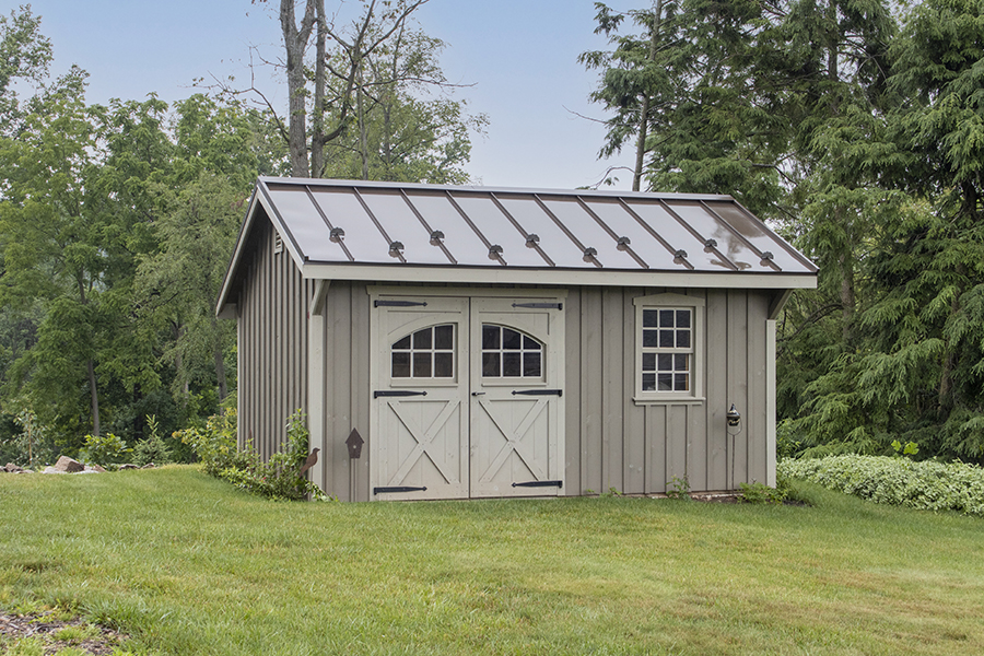 Front exterior of a gray Garden Quaker Shed