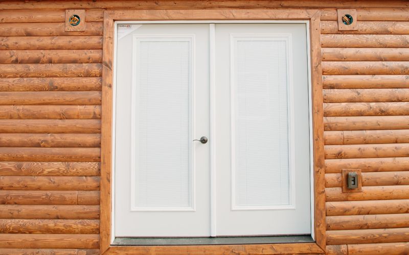 Close up of French Doors on a cabin's exterior