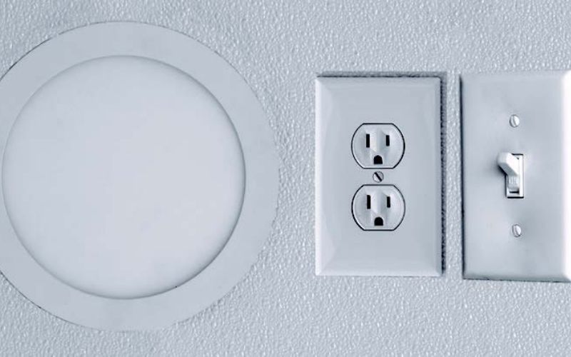 Standard electrical package with a light, outlet, and light switch