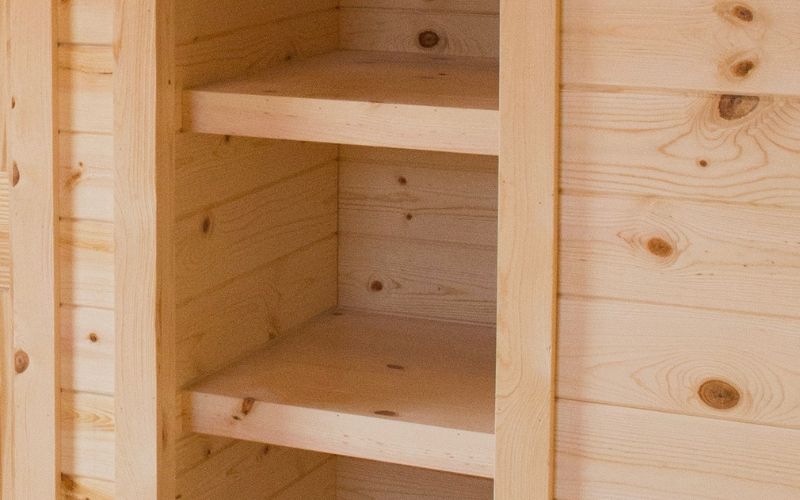 Close up of wood shelves in a cabin