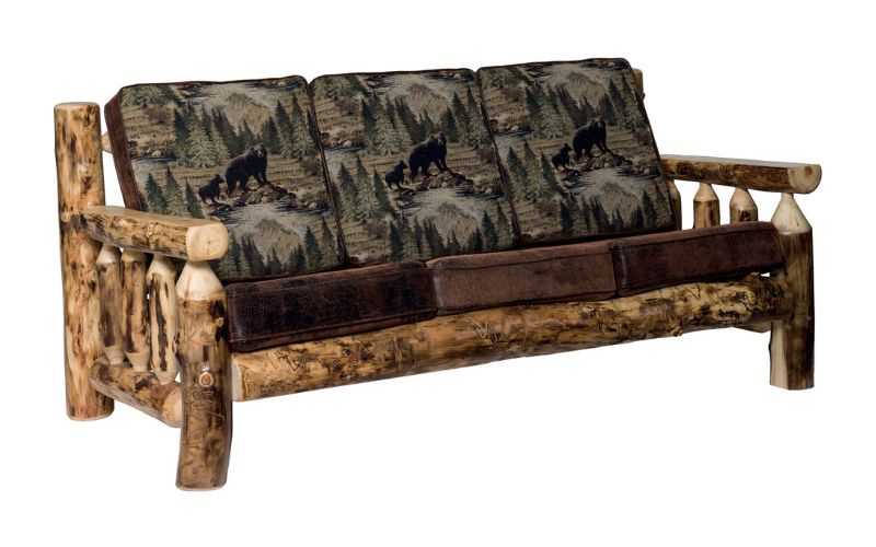 An Aspen Collection Sofa with 3 brown cushions and pillows with a bear print