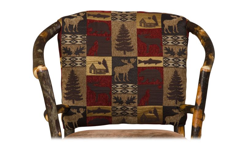 Red, brown, and yellow fabric pattern with trees, cabins, moose, antlers, wolves, bears, and fish