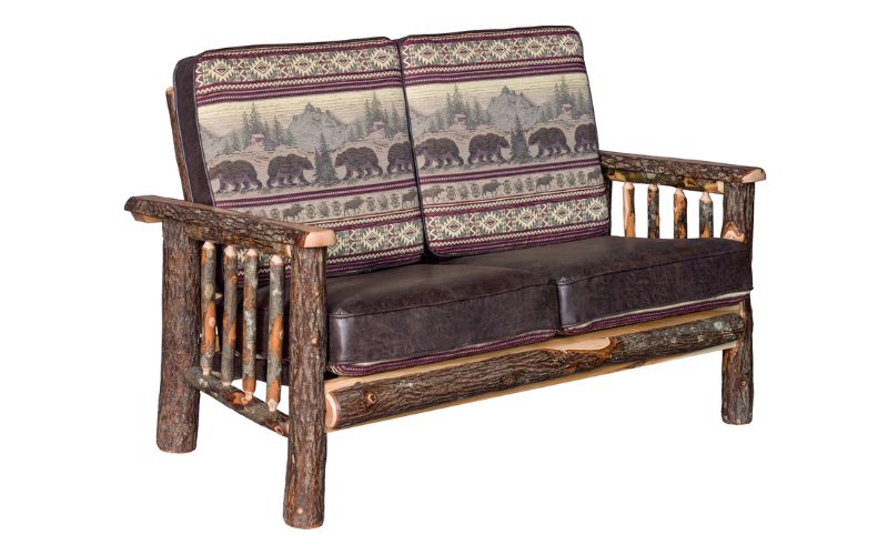 Wood base loveseat with 2 bear patterned back cushions and 2 brown leather seat cushions