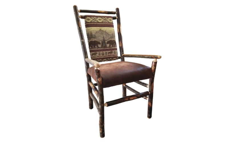 Medium back dining arm chair with a bear patterned back cushion and a brown leather seat cushion