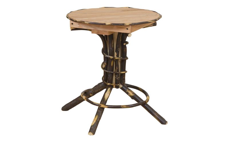 Round pedestal end table with light wood and dark branch accents