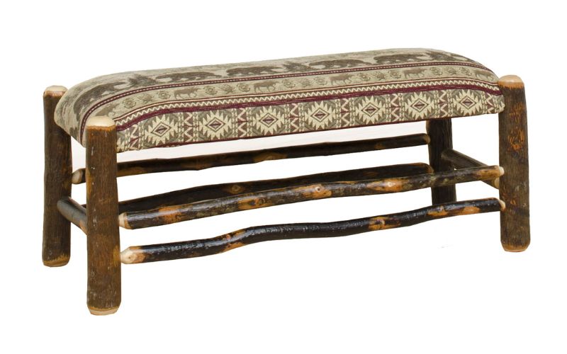 Wood bench with red and tan patterned seat cushion