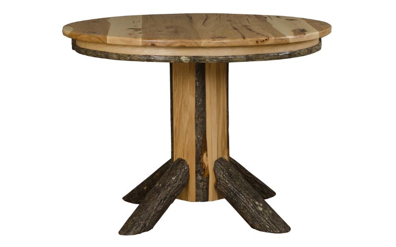 Single pedestal dining table with natural woodgrain and branch legs