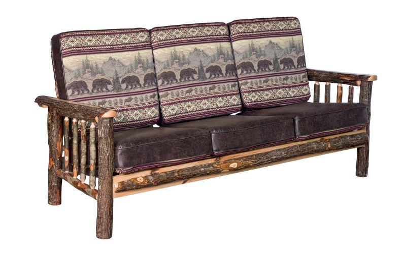 Wood base sofa with 3 bear patterned back cushions and 3 brown leather seat cushions