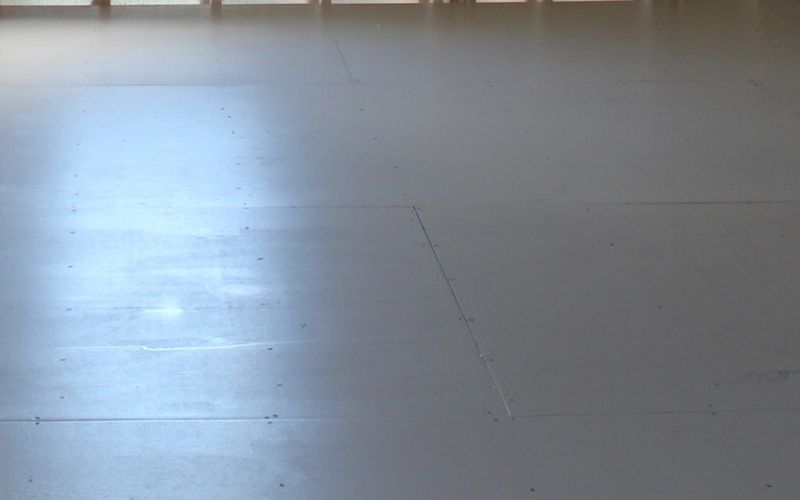 Close up of a shed floor with finished painted flooring