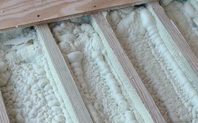 Close up of spray foam insulation in a shed floor