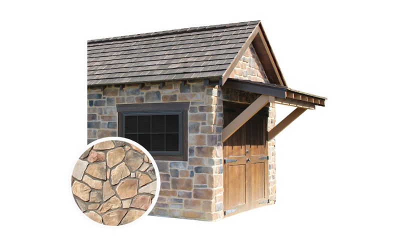 Shed with stone siding and a brown roof