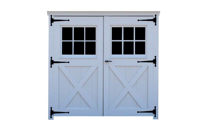 Carriage house wood double door in white with squared glass and black hinges