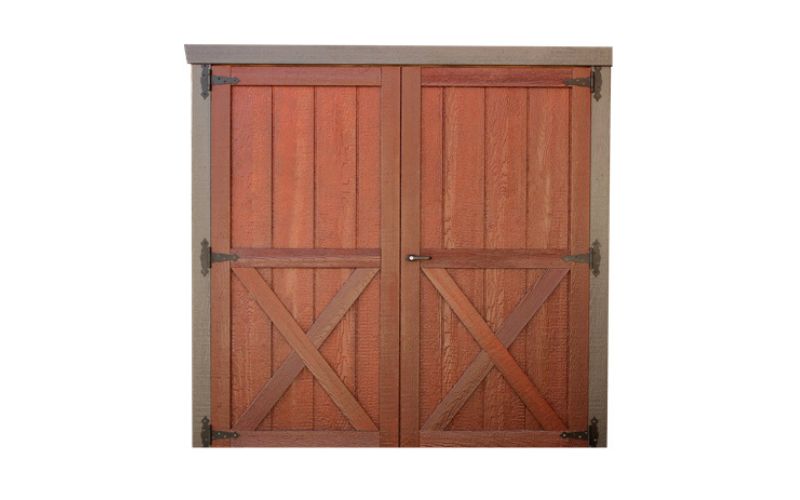 Wood double door in a brown stain with black hinges and no windows