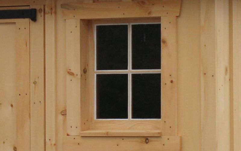 Close up of a 4-pane wood window
