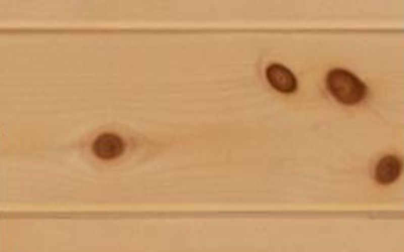 Close up of Knotty Pine Clear cabinet stain.