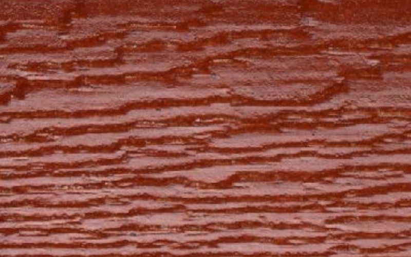 Close up of Red Wood Urethane stain on lap siding.