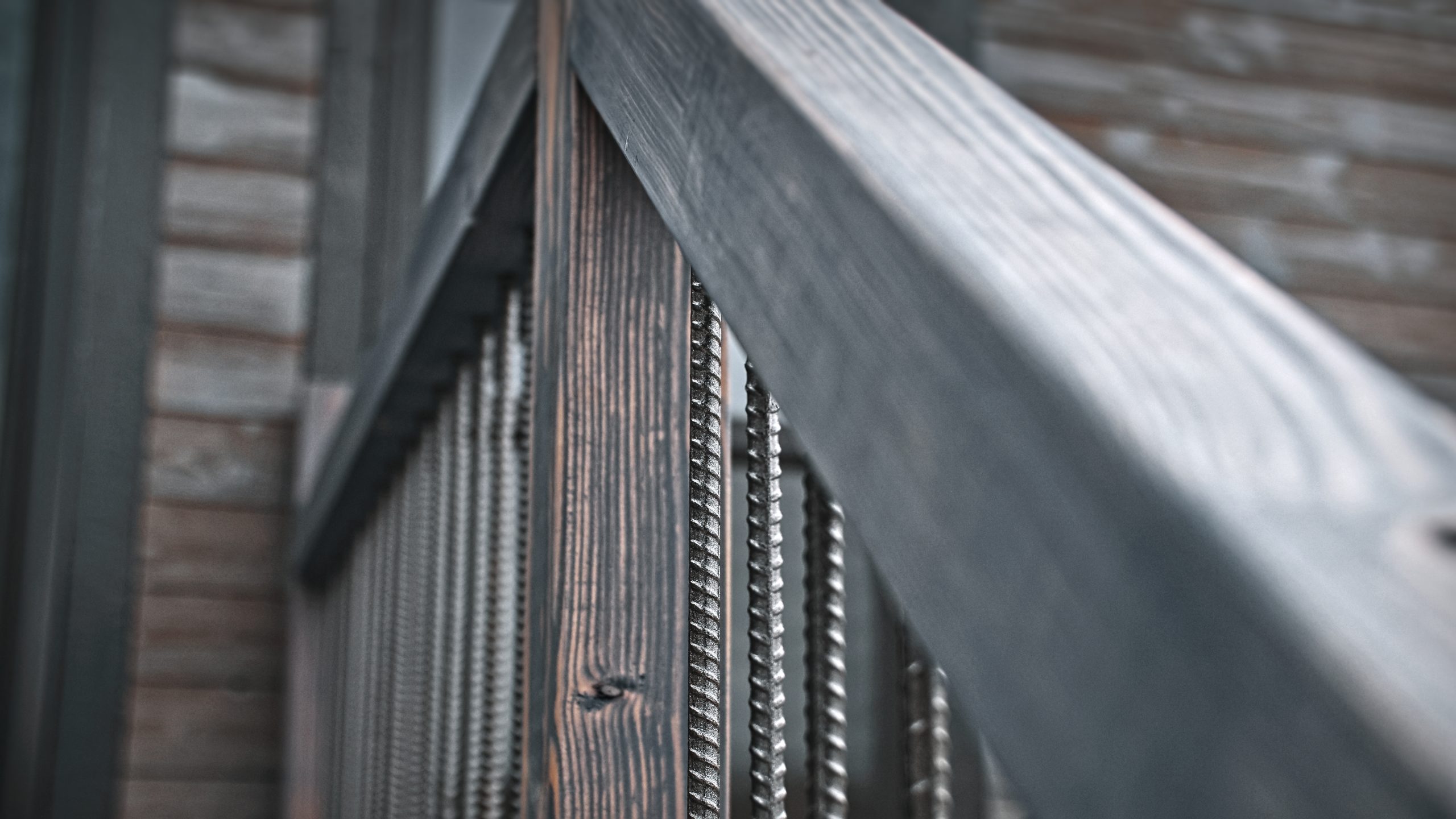 Close up of a railing attached to the deck entrance of a Meadowlark Park Model.