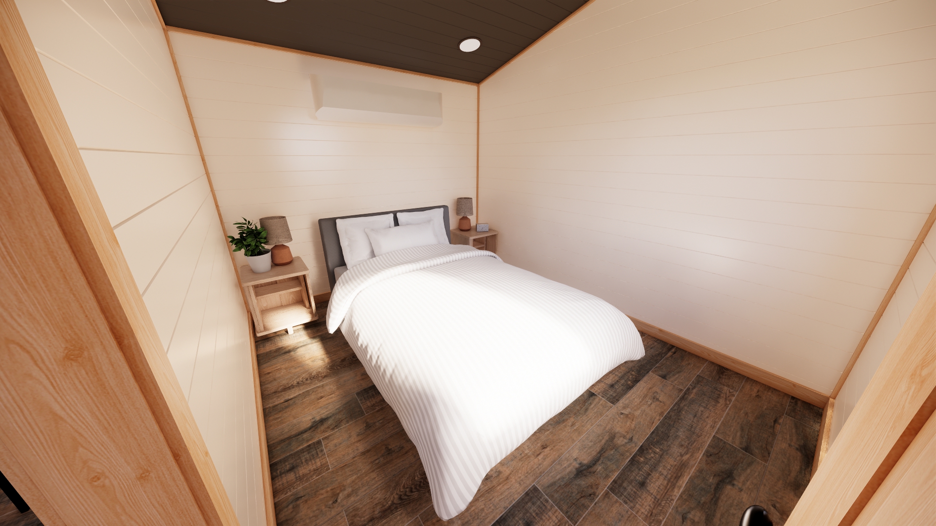 bedroom in cascade park model with dark wood ceiling