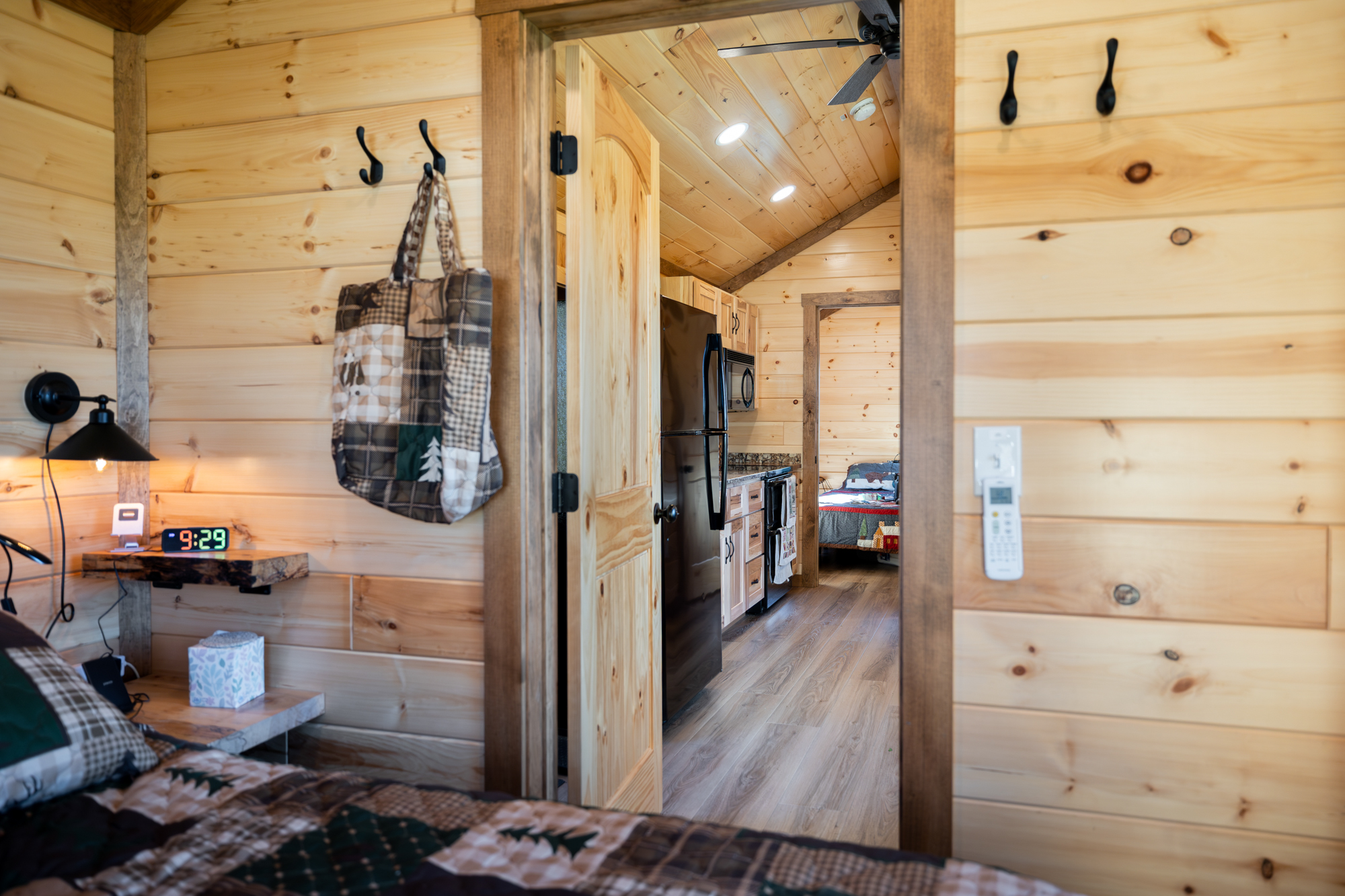 bedroom leading to kitchen in park model