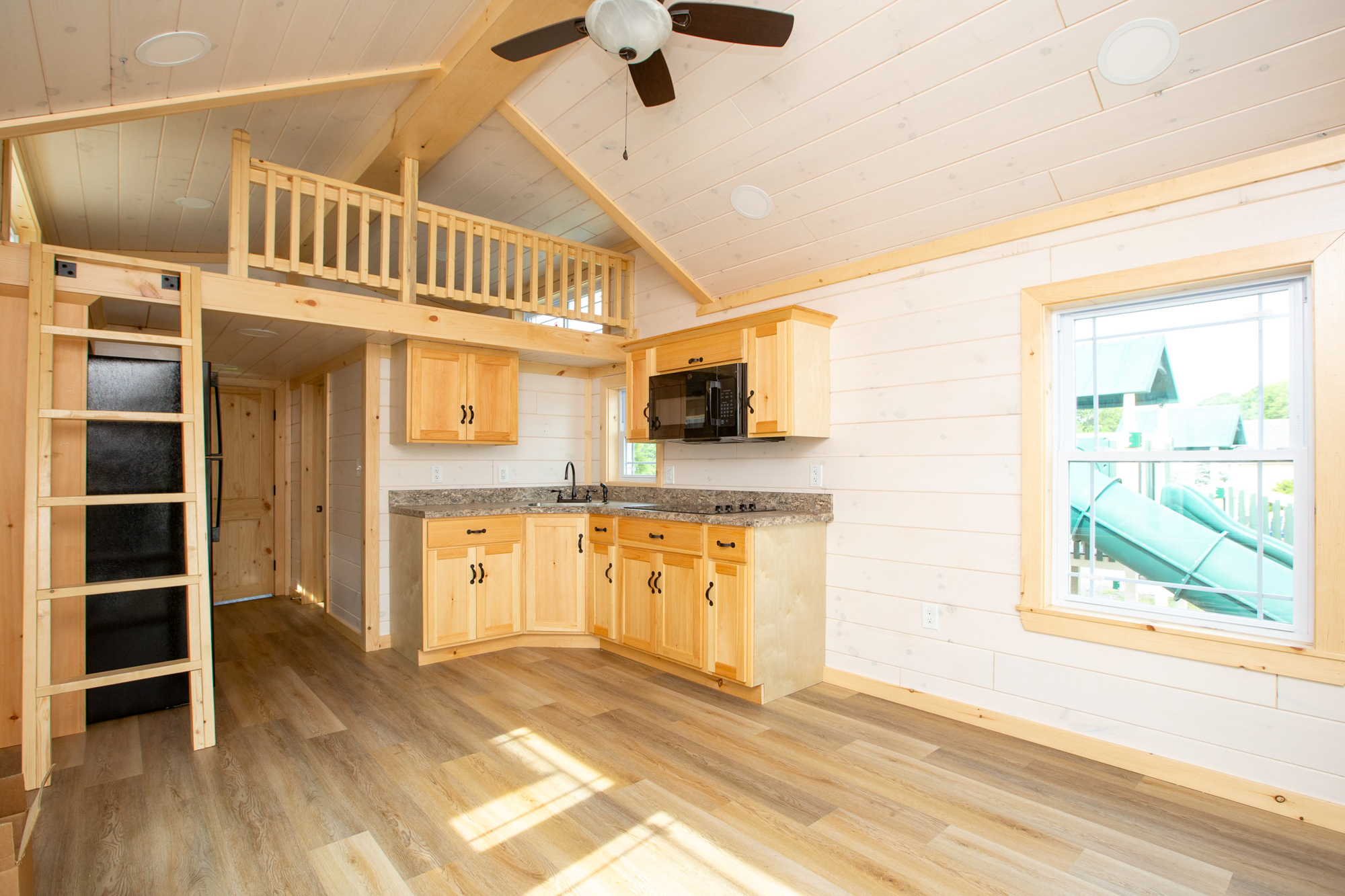 empty interior of summit view park model with combined kitchen and living space