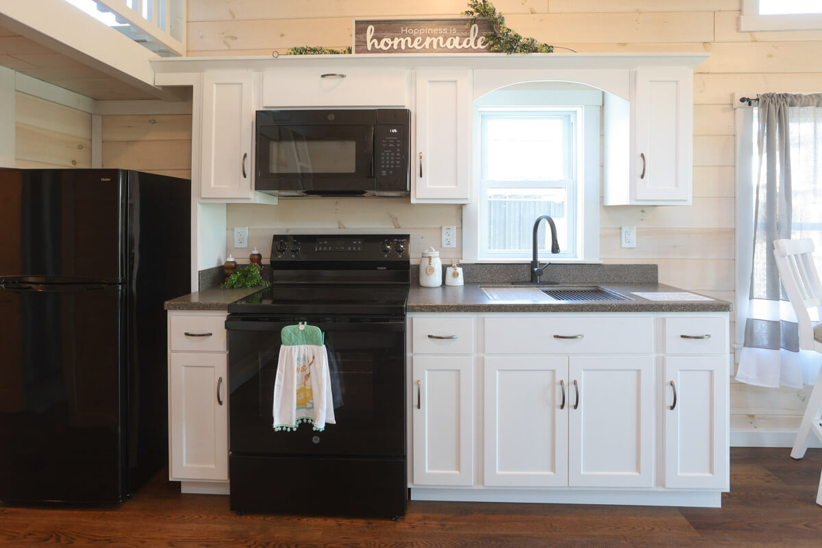 fully-equipped kitchen in park model